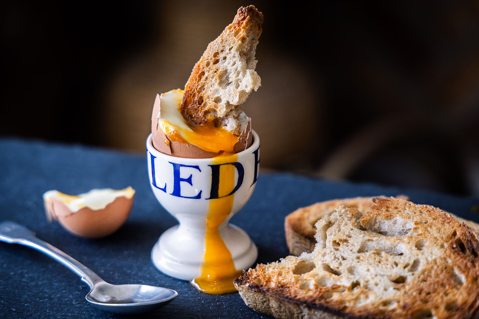 Soft boiled egg with toast dipped in.